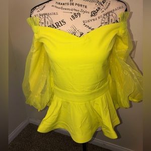 Never worn, beautiful off-shoulder peplum blouse, with puffy sheer sleeves.